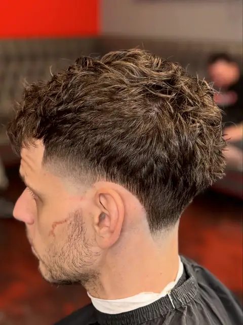 Textured fringe with a mid taper, cut by Raekwon